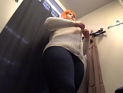 A hidden camera in a public fitting room at the mall caught bbw.