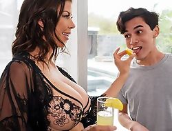 Dark-haired housewife seduces and fucks young conjoin boy