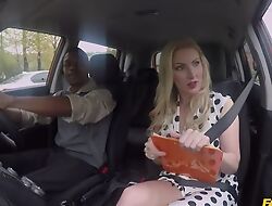Busty driving school instructor pleasuring nigga in the car